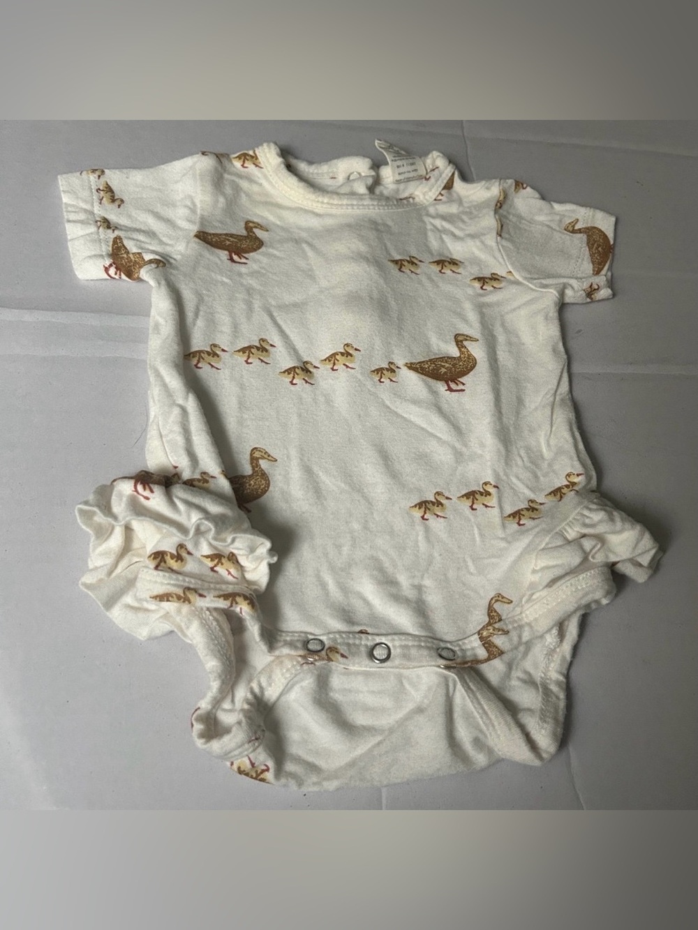 KATE QUINN Ruffle Bodysuit Duck Print